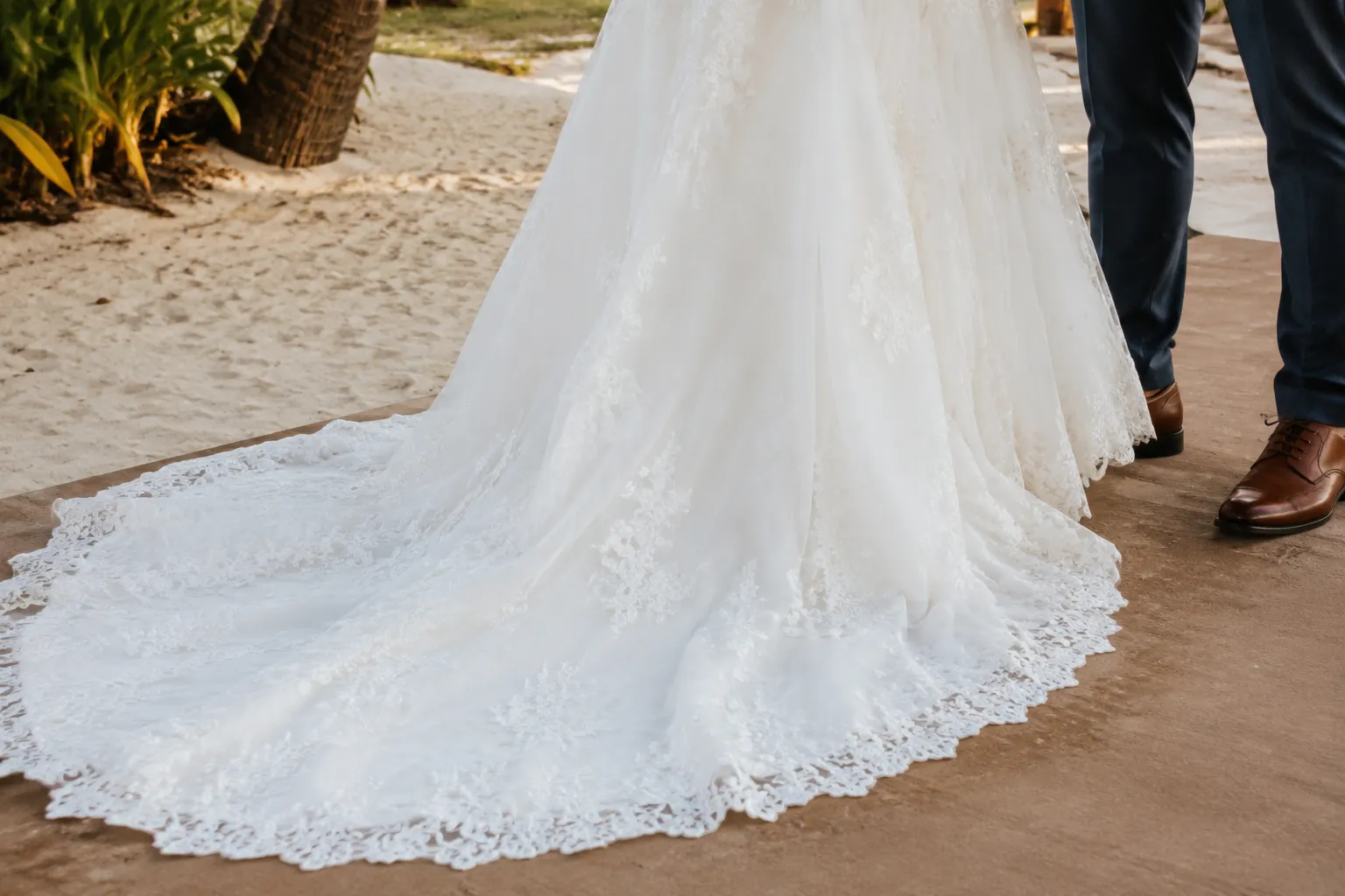 Beach wedding dress hem and train planned for sand, paths, and footwear